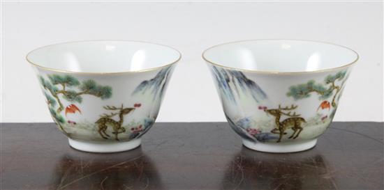 A pair of Chinese famille rose cups, 8cm diam.